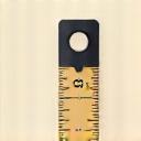 Stylized icon of a measuring tape.